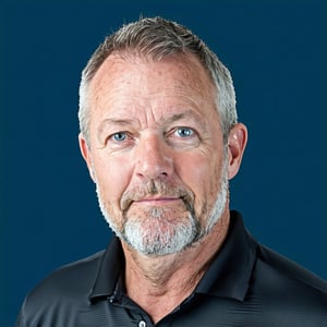 linkedin picture for a facility turnaround manager 50 year old white man with a small grey beard